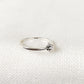 Zoom sur le poinçon 925 de la Bague Estrella en Argent Sterling, affichant la garantie d'authenticité et de qualité de l'argent sterling.