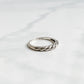 Vue du dessus de la bague Sylva en argent 925, design torsadé poli brillant.