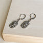 Boucles d’oreilles pendantes Estrella en acier inoxydable argenté avec pendentif étoilé texturé