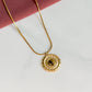 Collier Bahia doré avec pendentif rond en œil de tigre