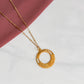 Collier Escale doré avec pendentif rond texturé