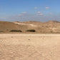 Paysage désertique aux reliefs ondulés ayant inspiré le collier Dune